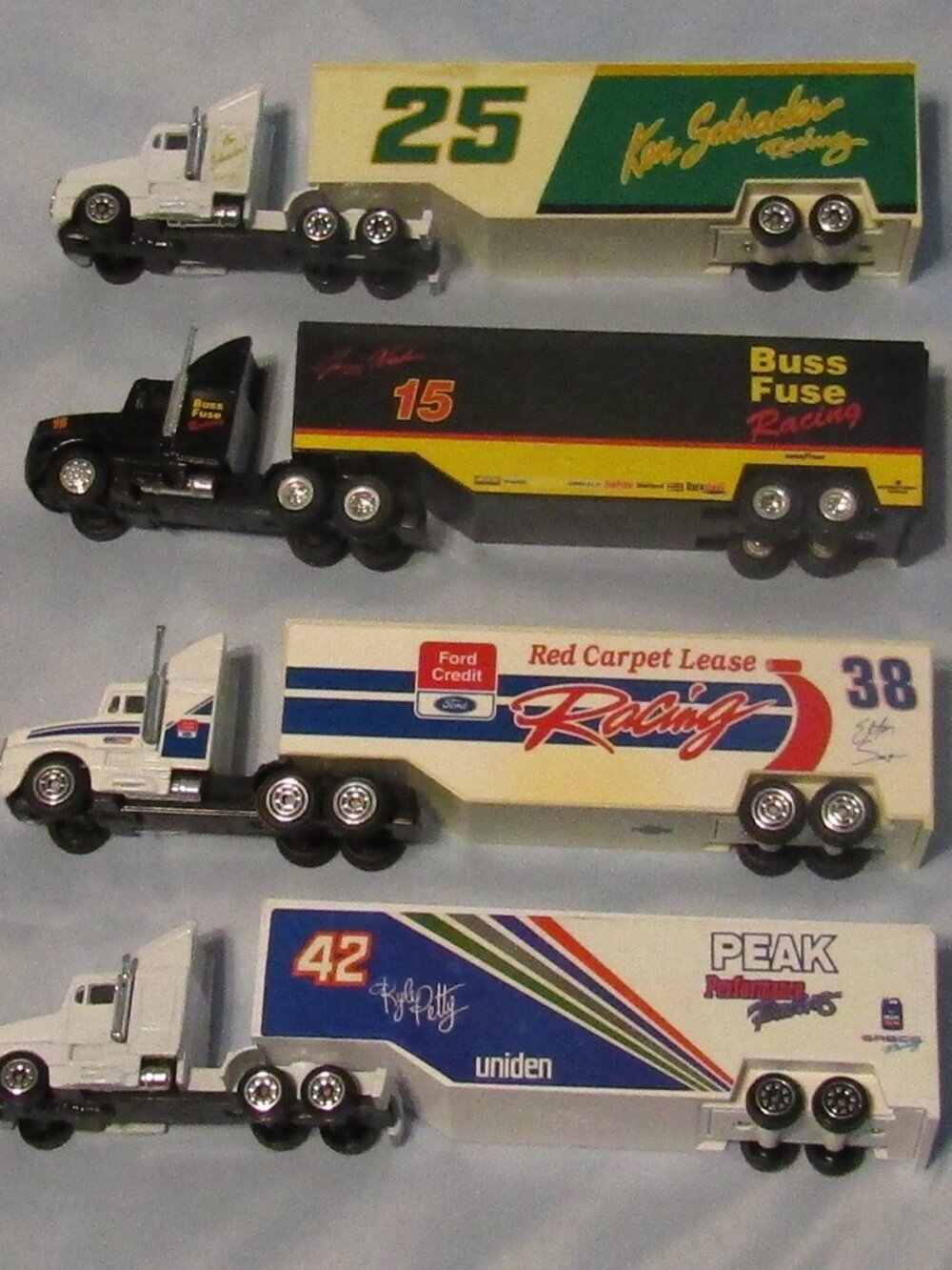1990s RACING CHAMPIONS NASCAR TRANSPORTER TRUCKS +3cars #42 PETTY #38 #25 #15